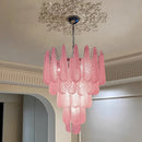 Coloured glass pendant with decorative leaf for chic interiors