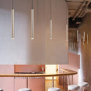 Modern gold LED pendant light for minimalist interiors