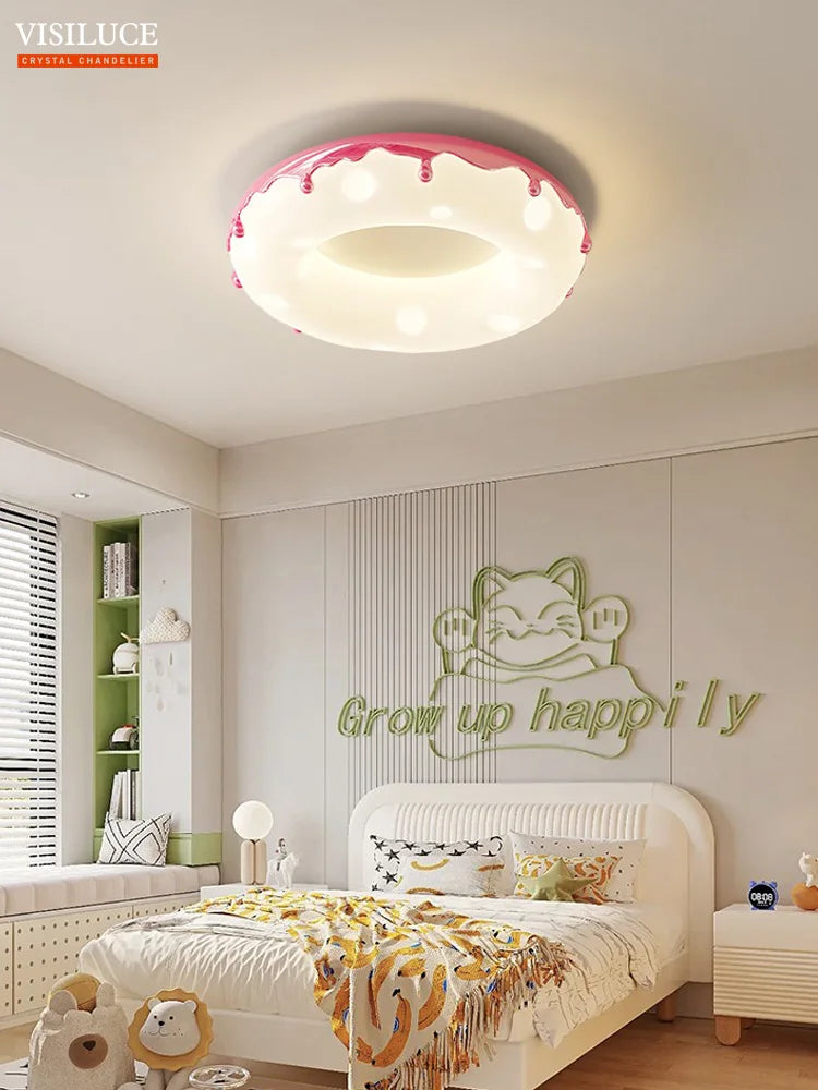 Minimalist LED ceiling light with decorative donut design - vue 3 sur 14