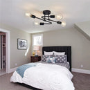 Black ceiling light with 4 rounded arms