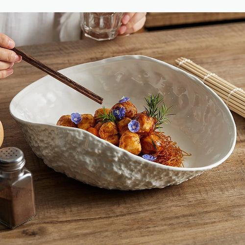 Assiette creuse ovale style coquillage motif roche minimaliste