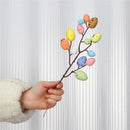 Easter decorations with branches and colourful eggs 2025
