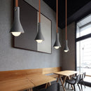 suspension industrielle en cuir et ciment style rétro pour bar