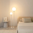 lampadaire simple en métal avec 3 gradations et verre