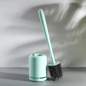 Wall-mounted toilet brush with convenient storage holder