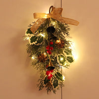 couronne de noël décoration de porte avec baies et cloches
