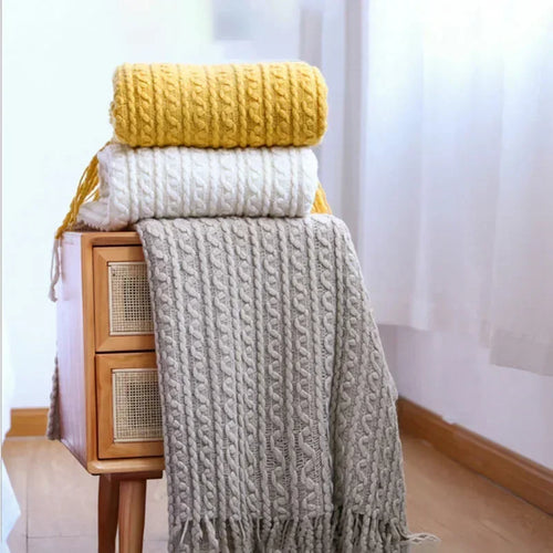 plaid boheme ultra doux a carreaux avec pompons