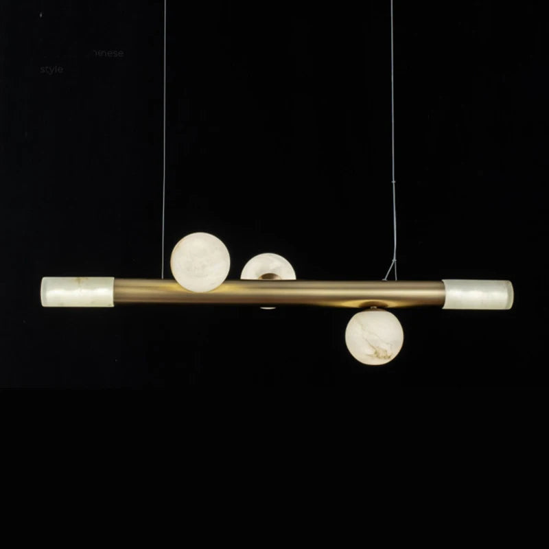 barre avec boule suspension table ronde en marbre éclairage salon de thé - vue 4 sur 7