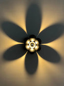 Minimalist flower shaped wall light for a soft atmosphere