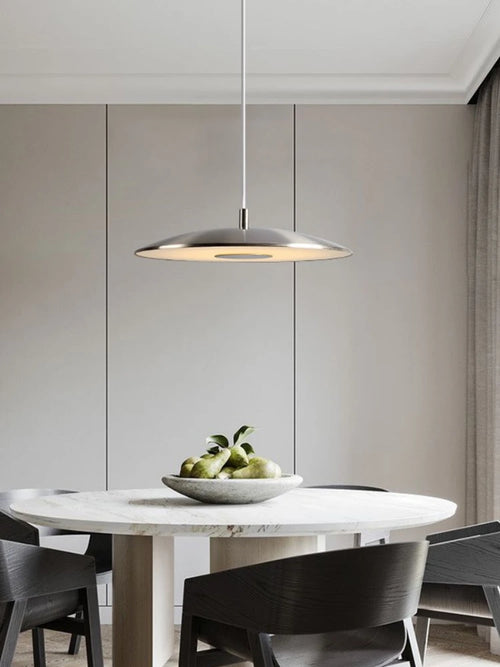 Minimalist circular pendant light with flying saucer design