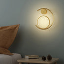 Modern gold metal wall light for a minimalist atmosphere