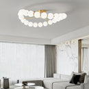 lustre à led avec anneau en cuivre et boule acrylique