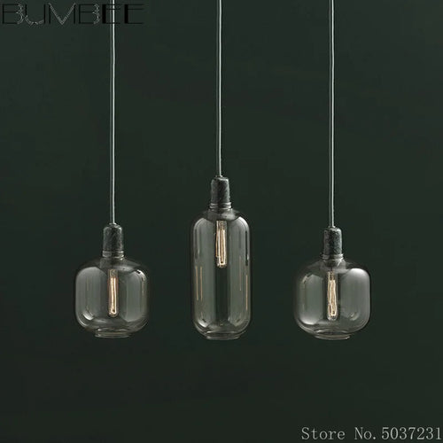 suspension en verre avec détail en marbre design industriel élégant