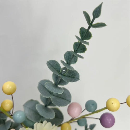Easter decoration with artificial eggs and colourful flower bouquets - vue 3 sur 11