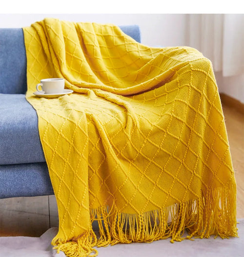 plaid tricot doux avec pompons style cosy salon