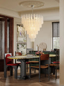 Coloured glass pendant with decorative leaf for chic interiors