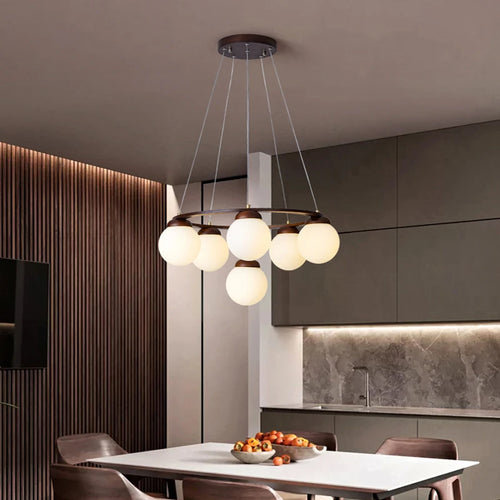 suspension en bois avec boule de verre design moderne