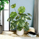 Realistic and elegant artificial monstera plant for interior decoration