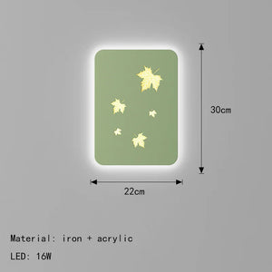 Dimmable metal wall light with maple leaf design