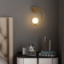 Modern gold metal wall light for a minimalist atmosphere