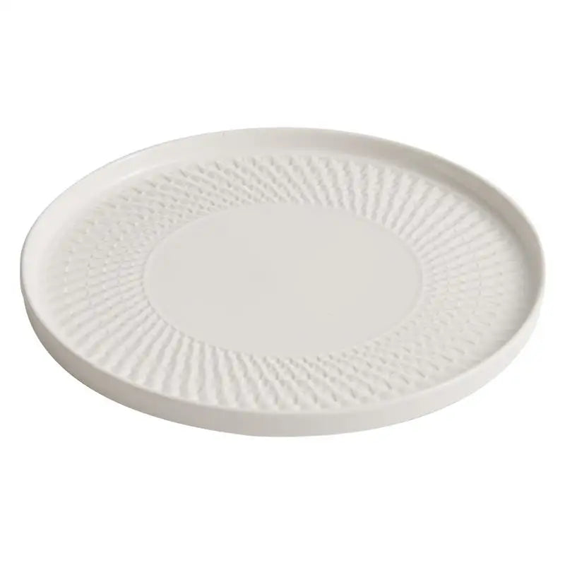 Assiette ceramique texturee relief style artisanal service