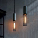 lampe suspendue en béton industriel avec abat-jour en fer