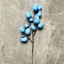 Easter decorations with branches and colourful eggs 2025