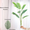 palmier artificiel en plastique avec feuilles de monstera pour jardin