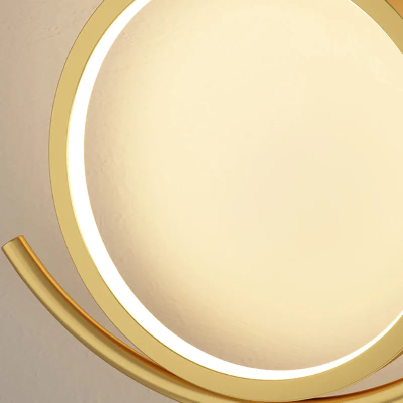 applique murale moderne en métal doré pour atmosphère minimaliste