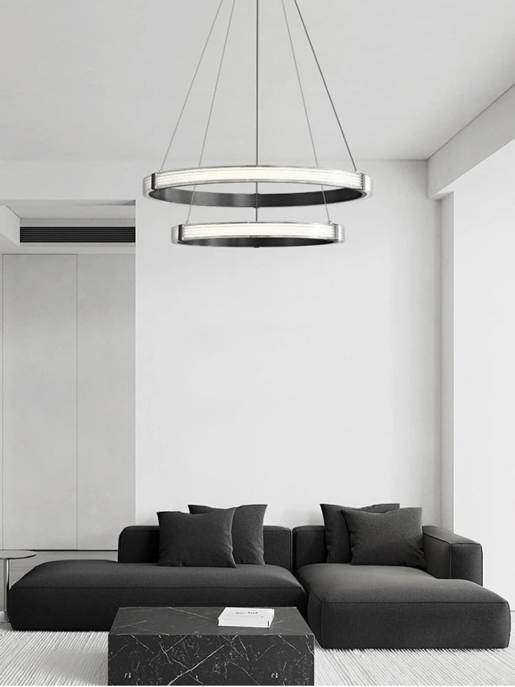 Modern circular acrylic pendant light for minimalist interior decor - vue 4 sur 9