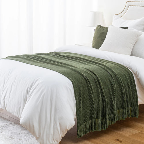 Plaid maille chenille a pompons motif carreaux decoratif
