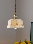 suspension élégante en laiton et céramique moderne pour votre intérieur