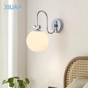 Bauhaus bowknot round LED chrome wall light