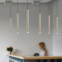 Modern gold LED pendant light for minimalist interiors