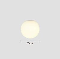 Minimalist glass LED wall light for indoor use