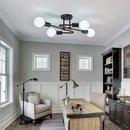 Black ceiling light with 4 rounded arms