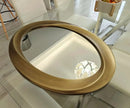 miroir ovale à bord biseauté cadre incurvé style baroque élégant