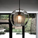 suspension ronde en verre style industriel lumineux et élégant