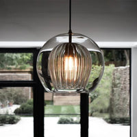 suspension ronde en verre style industriel lumineux et élégant