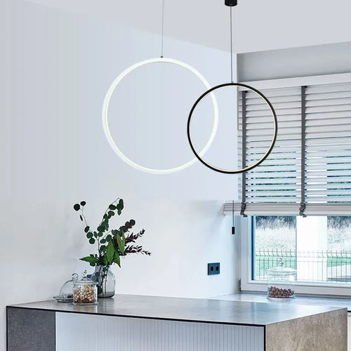 Minimalist circular pendant chandelier for modern interiors - vue 6 sur 18