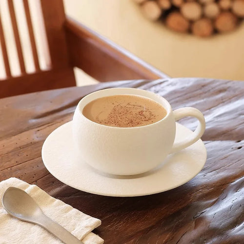 Tasse retro ceramique avec soucoupe motif pierre brute