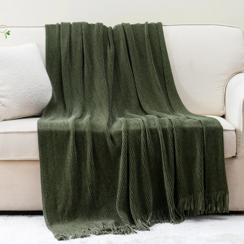 Plaid maille chenille a pompons motif carreaux decoratif
