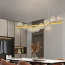 lustre nordique longue boule de verre or pour bar