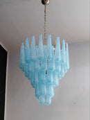 Coloured glass pendant with decorative leaf for chic interiors