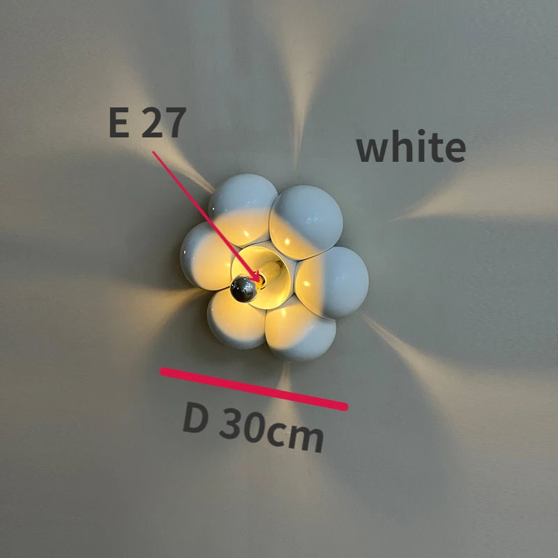 Minimalist flower shaped wall light for a soft atmosphere