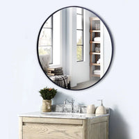 Minimalist circular metal mirror for decoration and makeup