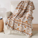 plaid tricoté bohème à pompons motif géométrique doux