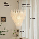 Coloured glass pendant with decorative leaf for chic interiors