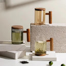 tasse en verre borosilicate avec poignée en bois et couvercle