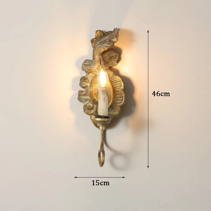 Vintage wall light in aged iron and wood for indoor decoration